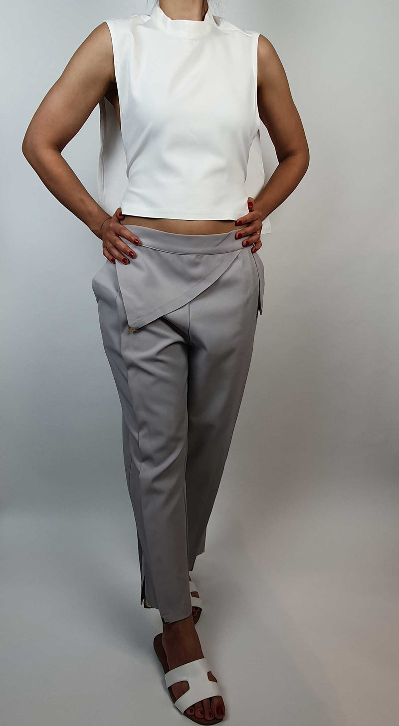 Danfi white top with grey tapered trousers front