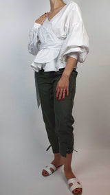 Danfi white crop top with green trousers2